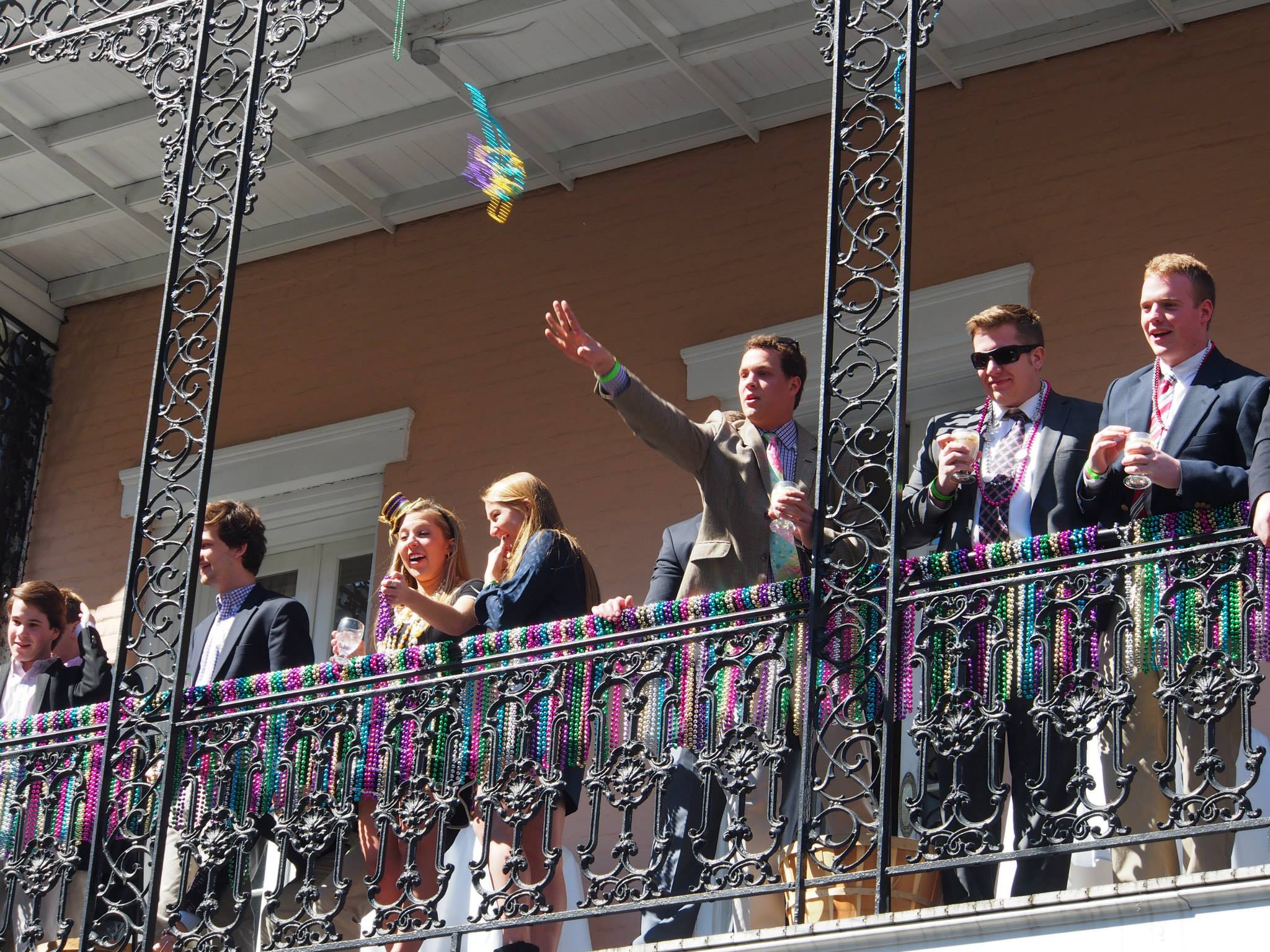mardi-gras-throwing-beads-new-orleans